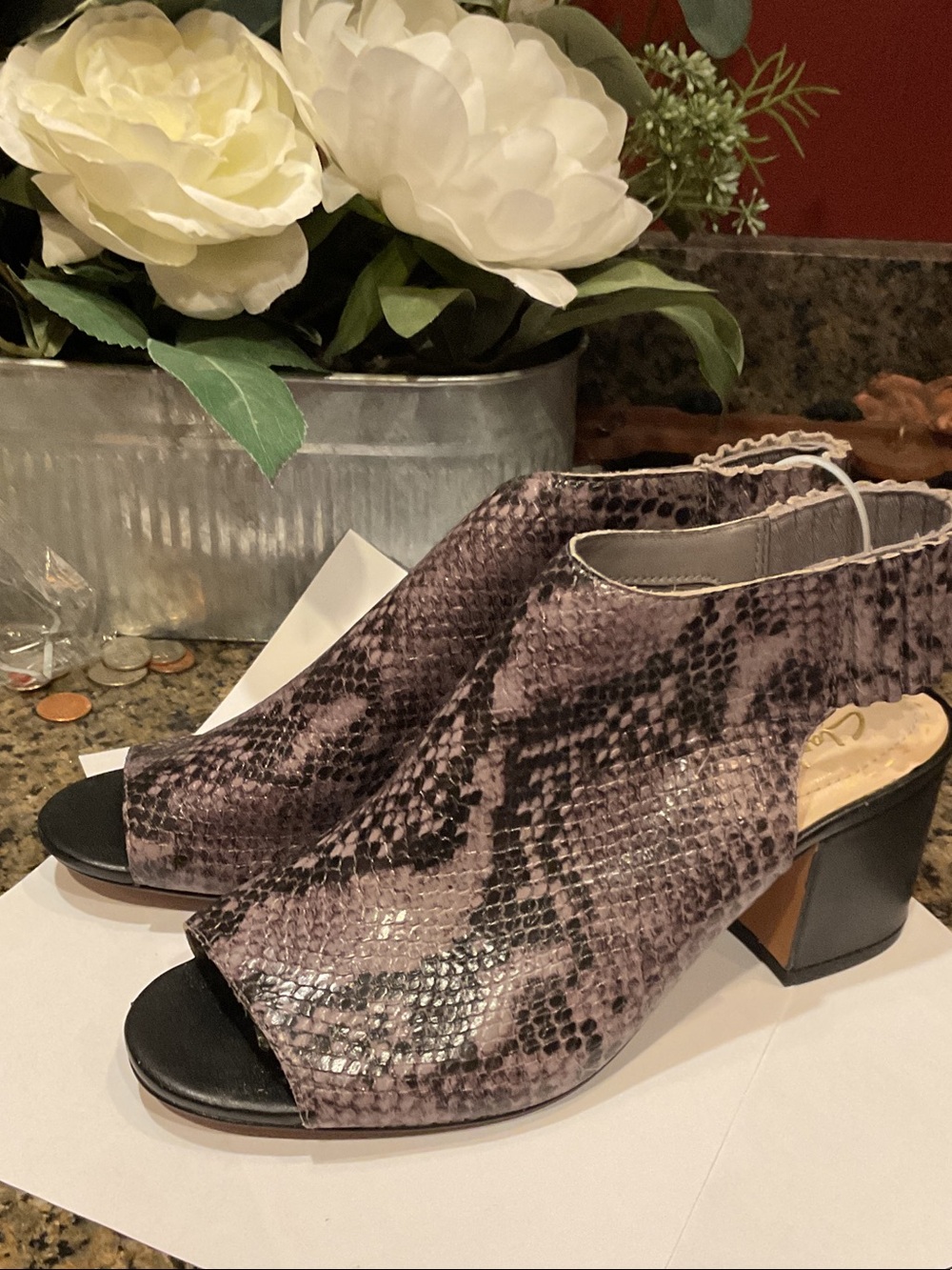 Clark’s lizard open toe with flexible heel strap make for a fun shoe with jeans.